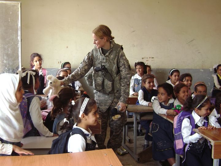 <p>Theresa visiting a girls school in Numaniyah, Iraq</p>