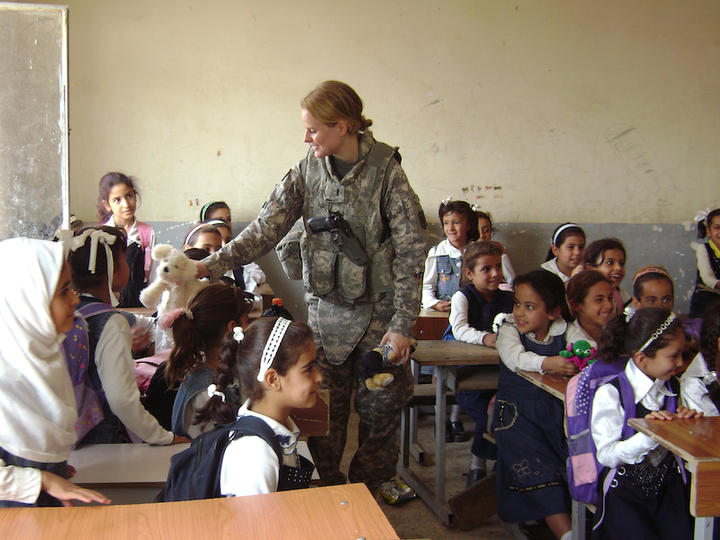 <p>Theresa visiting a girls school in Numaniyah, Iraq</p>