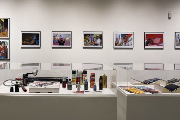 <p>Tools of the trade under plexi<em>: All Big Letters</em> curated by RJ Rushmore at Haverford College’s Cantor Fitzgerald Gallery. Philadephia, PA (photo © Lisa Boughter)</p>