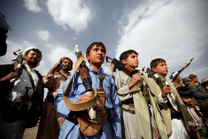 Boys attend a pro-Houthi tribal gathering in Sana'a, Yemen, on June 20, 2016.