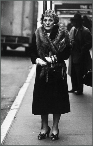 Woman in a mink stole and bow shoes, N.Y.C., 1956.