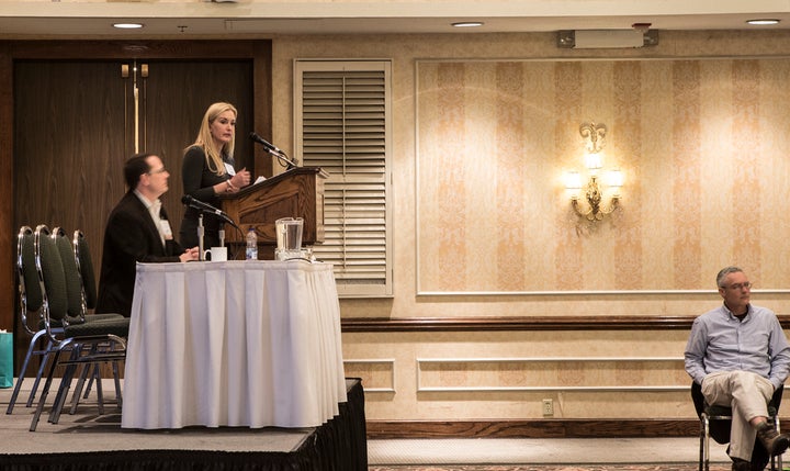 <p>Carey Gillam addresses attendees at COG Toronto’s annual conference (2017).</p>