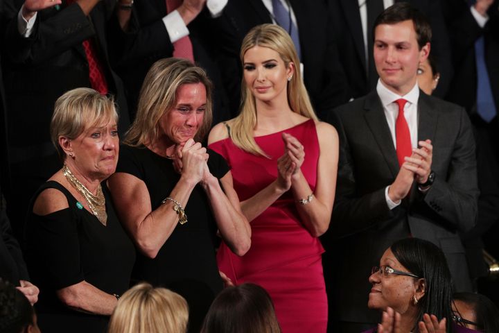 Carryn Owens receives a standing ovation in tribute to her late husband during Trump's speech.