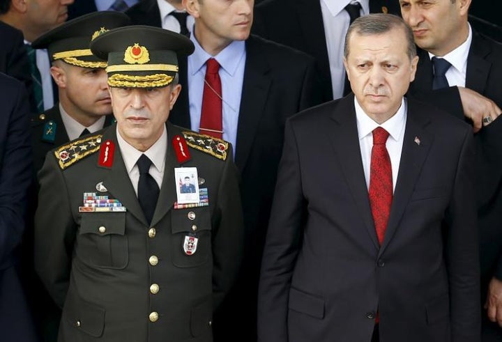 Turkish Army Chief Gen. Hulusi Akar (L) and Turkish President Recep Tayyip Erdogan.