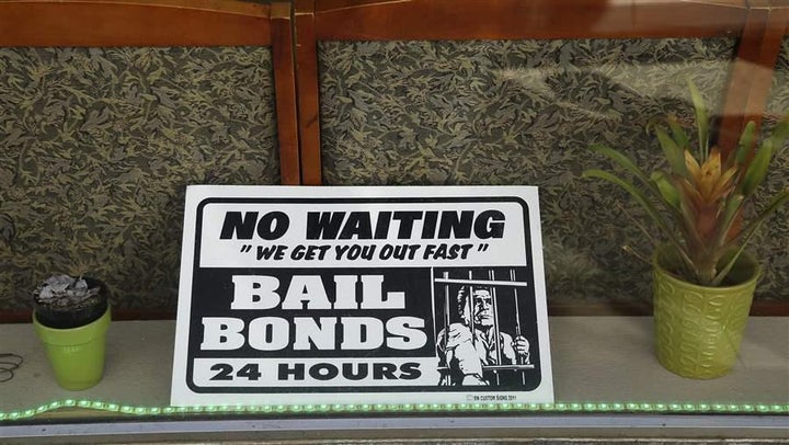 <p>A sign in the window of a bail bonds office across from the Hall of Justice in San Francisco. Increasingly, states are reevaluating the purpose of cash bail and are making big changes to the practice.</p>
