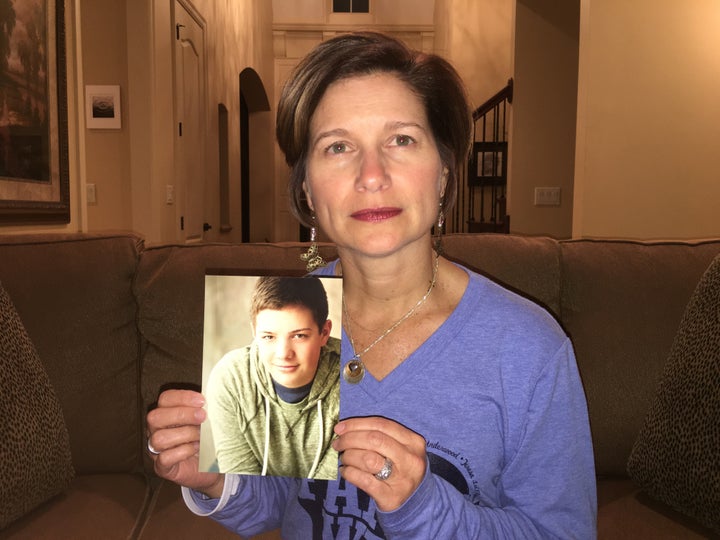 Mindy Corporon holds a photo of her son, Reat Griffin Underwood, who, along with her father, was killed in a 2014 shooting at the Jewish Community Center of Greater Kansas City.