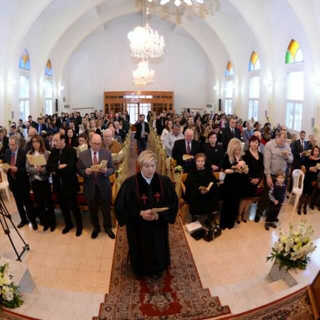 <p>Rola Sleiman in the Presbyterian Church in Tripoli during her ordination on February 26, 2017.</p>