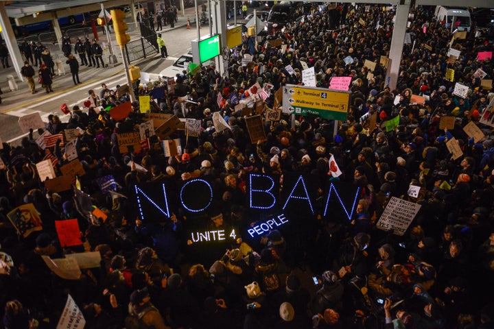 Protesters rally against President Donald Trump's travel ban at John F. Kennedy International Airport on Jan. 28, 2017, in New York City.