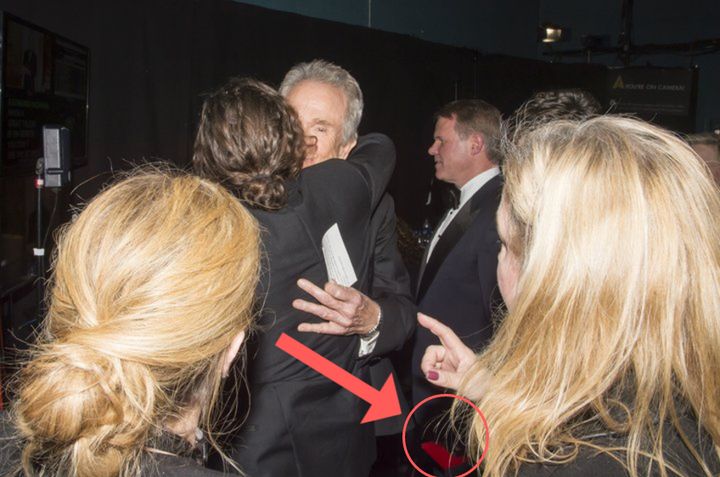 Warren Beatty and Brian Cullinan during 89th annual Academy Awards, backstage. The Best Picture/Best Actress envelopes can be seen in the red circle. Andrew H Walker/REX/Shutterstock