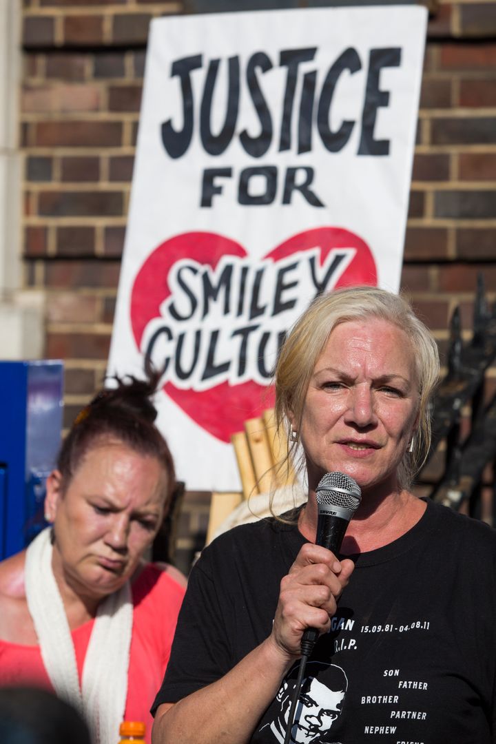 Duggan's mother, Pamela, left, listens to Carol Duggan, his aunt, during a protest outside Tottenham Police Station in August 2016 to mark the fifth anniversary of his death 