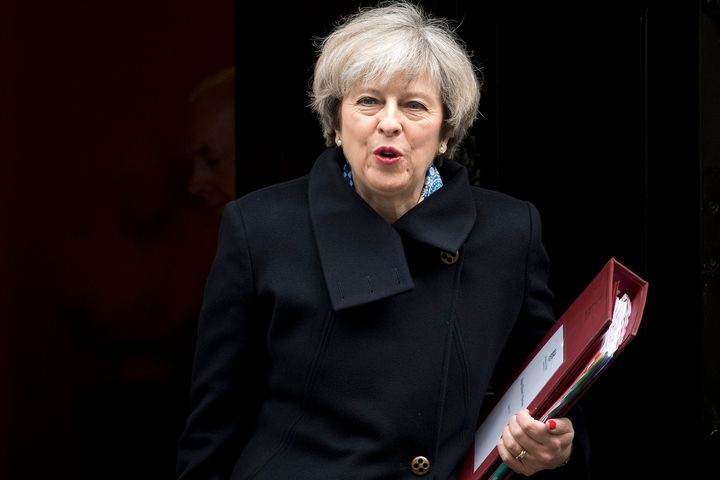 Theresa May leaves 10 Downing Street ahead of the vote in the Lords on Wednesday evening