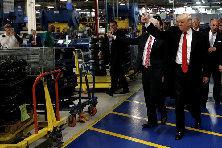 Donald Trump and Mike Pence tour a Carrier factory in Indianapolis on Dec. 1, 2016, less than a month after Trump's presidential election, to declare a victory for U.S. workers.