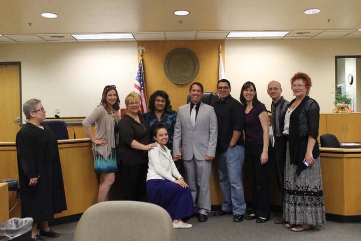 Adoption finalization at the Sacramento County Court in April 2014; Erica and Scott are surrounded by Erica’s “posse,” her in