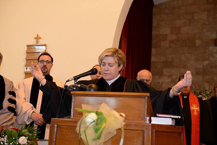 Reverend Sleiman gives her first blessing as an ordained pastor on Feb. 26, 2017.