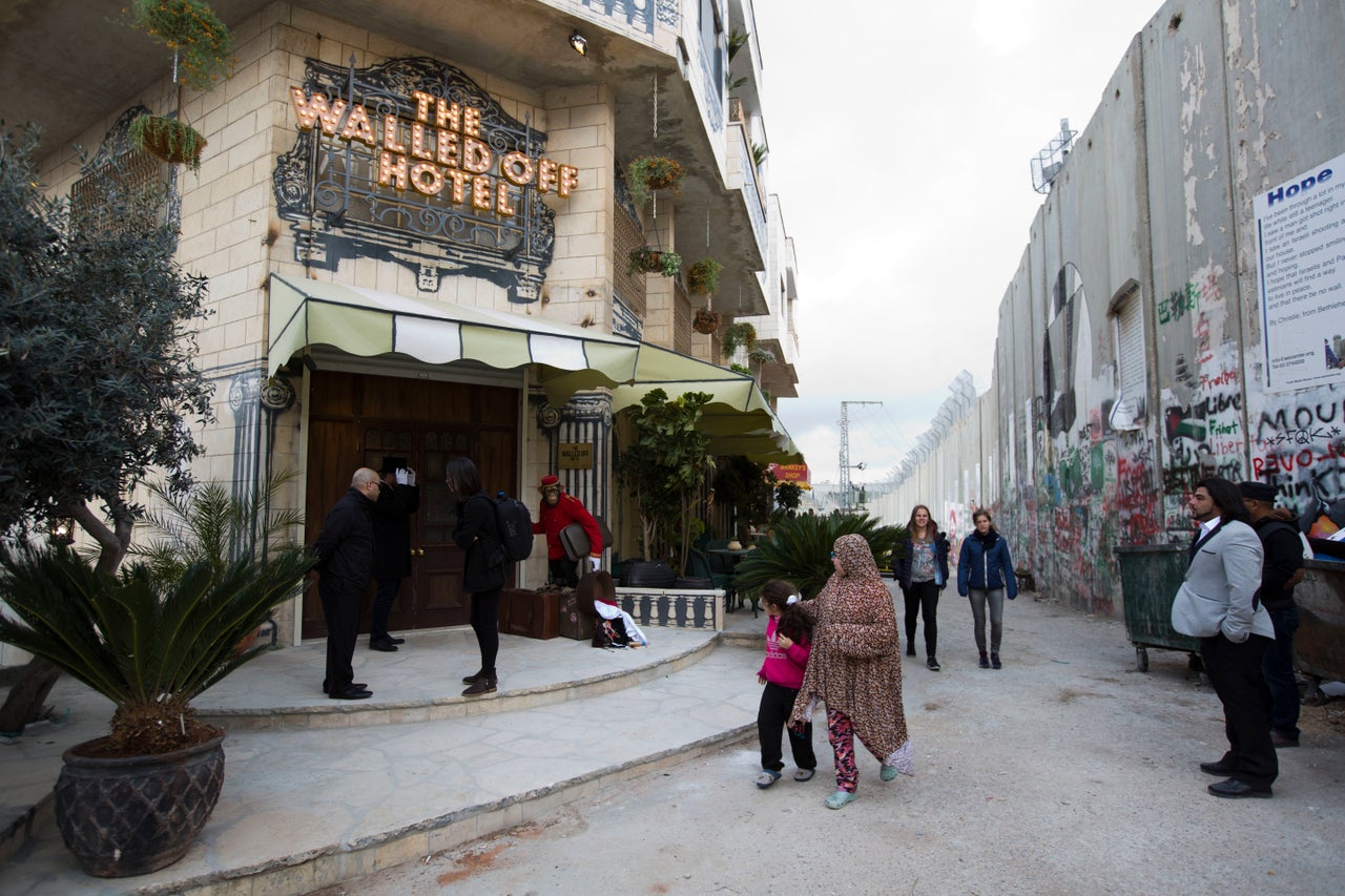 The hotel is right beside the wall which divides the territories