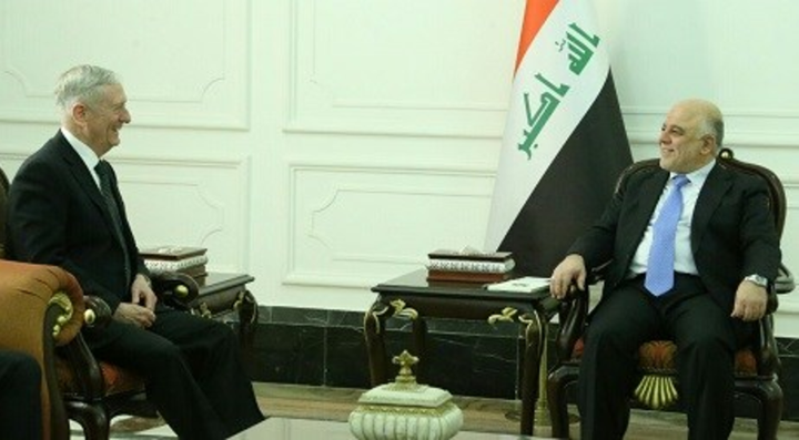 <p>US Secretary of Defense James Mattis speaks with Iraqi Prime Minister Haider al-Abadi in Baghdad on Feb. 20. Photo: Iraqi PM Office</p>