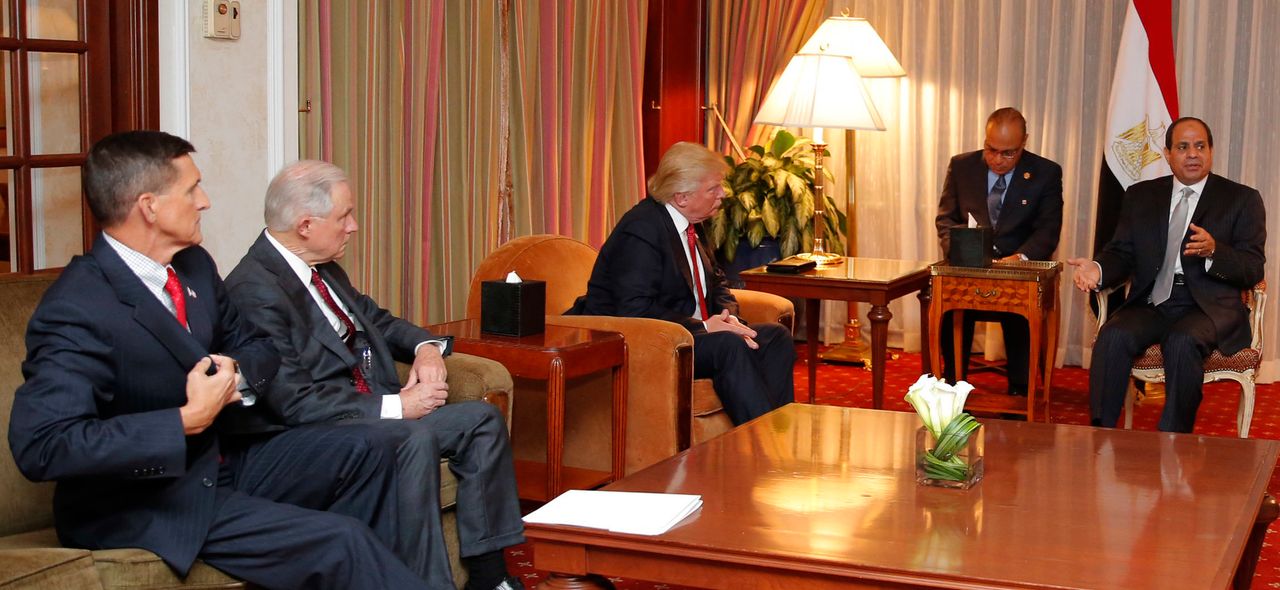 Retired Lt. Gen. Michael Flynn, then-Sen. Jeff Sessions (R-Ala.) and Republican presidential nominee Donald Trump listen to Egyptian President Abdel Fattah El Sisi at a meeting in New York on Sept. 19, 2016.
