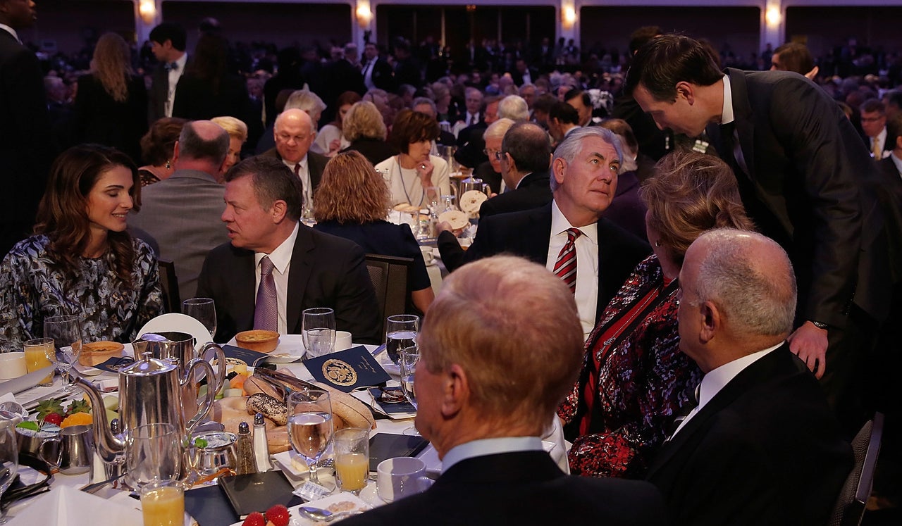 Secretary of State Rex Tillerson, center, talks with White House senior adviser Jared Kushner, President Donald Trump's son-in-law, while Jordan's King Abdullah II talks speaks with his wife, Queen Rania, at the National Prayer Breakfast in Washington on Feb. 2.