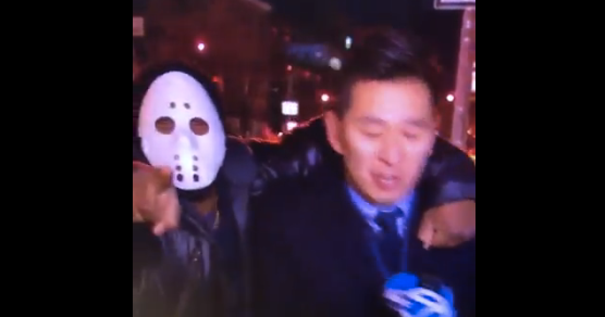 Masked Man Grabs Reporter On Live TV | HuffPost Latest News