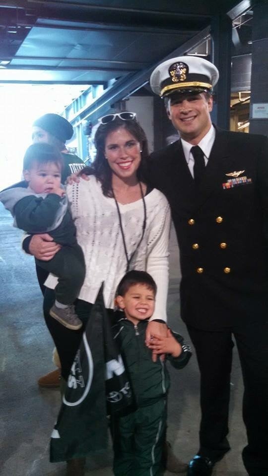 <p>Retired Lieutenant Commander and Ms Bellina with their two sons</p>