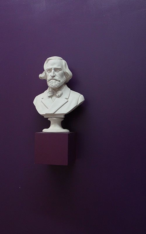 Busts of classical composers inspire students.