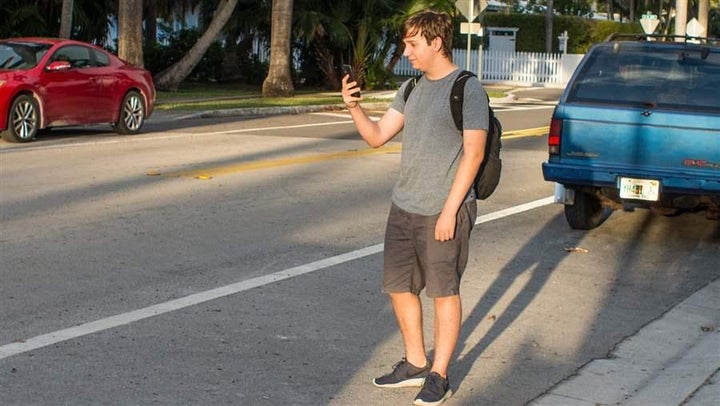 Henry Stock, 16, near his home in Hollywood, Florida. Like many teenagers, he doesn’t feel the need to get a driver’s license.