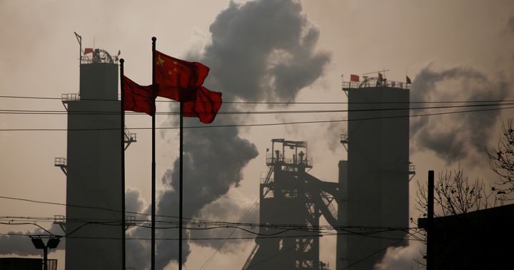 Chinese national flags are flying near a steel factory in Wu'an, Hebei province, China, February 23, 2017.