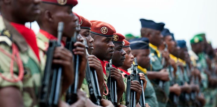 Military members from the Gabonese Armed Forces stand in formation in Libreville, on June 13 2016.