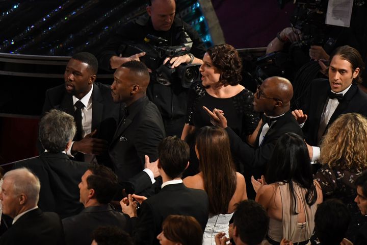 "Moonlight" actor Trevante Rhodes, Best Supporting Actor winner Mahershala Ali, producer Adele Romanski and director Barry Jenkins react after they won the Best Picture award at the 89th Oscars.