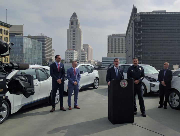 <p>Mayor Eric Garcetti & LAPD Chief Charlie Beck unveil EVs in June 2016</p>