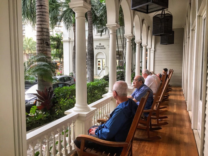 Time slows down on the porch of the Moana Surfrider Hotel, built in 1901.