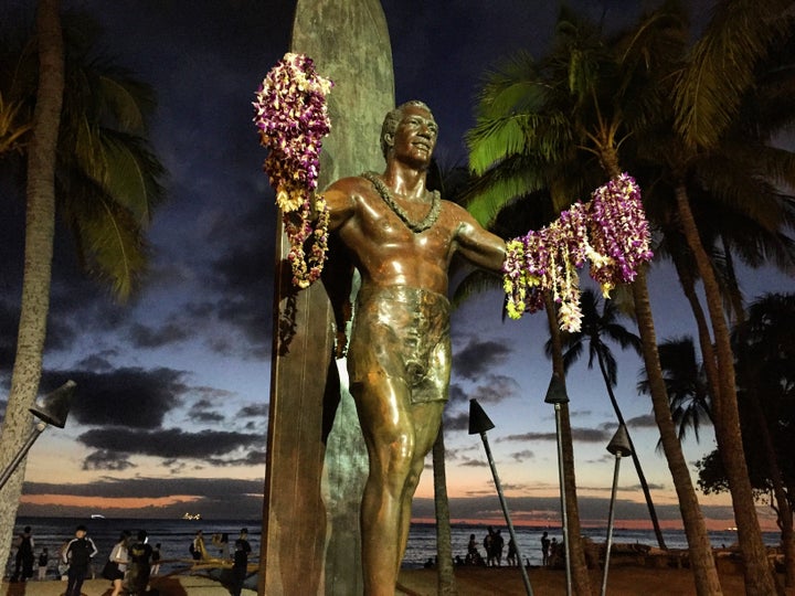 The statue of Hawaii’s most famous surfer, Duke Kahanamoku is always decorated with leis. 