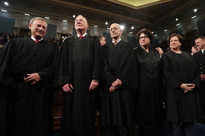 Justice Anthony Kennedy, second from left, said the Constitution empowers judges to question racially charged statements made by jurors during secret deliberations in a criminal case.