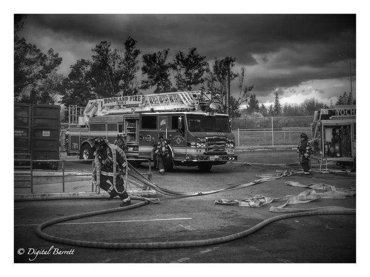 <p>Firefighters from the Woodland Fire Department and the Yoche Dehe Fire Department prepare to enter to simulated convalescent home.</p>