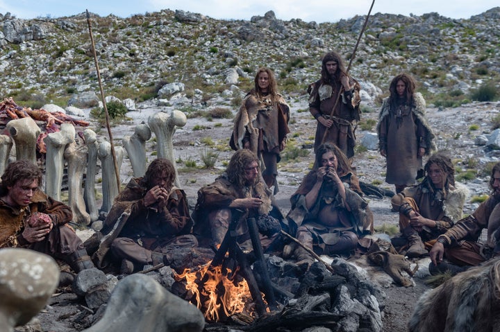 <p>Ancient humans enjoy a home cooked meal. Scene from the series <em>Origins: The Journey of Humankind</em>.</p>