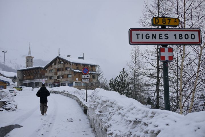 A road sign is seen on the side of a mountain road after a snow fall in Tignes on January 15 this year