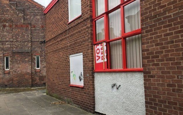 The smashed window in Eagle's constituency office building