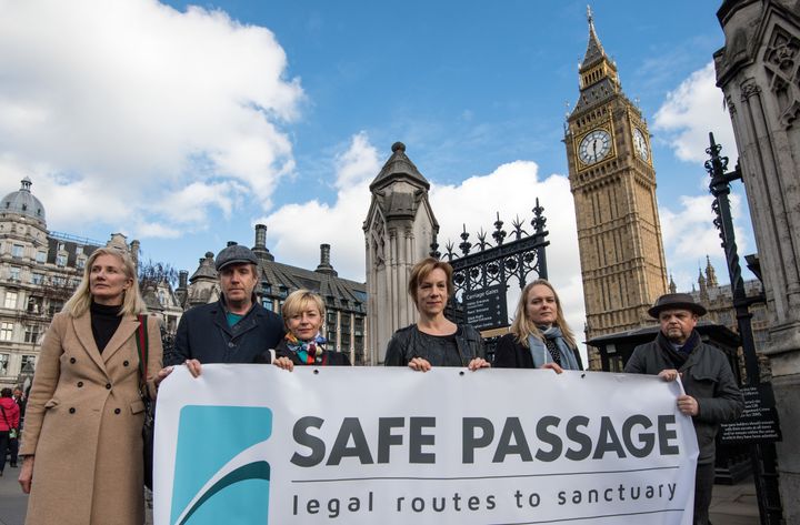 Celebrities including Toby Jones (R), Juliet Stevenson (C-R), Rhys Ifans (2-L) and Joely Richardson (L) campaigned outside Parliament today for the Dubs scheme to be reopened 