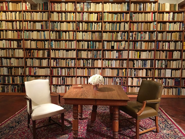 Shelves full of backward spines emphasize the gender imbalance in literature.