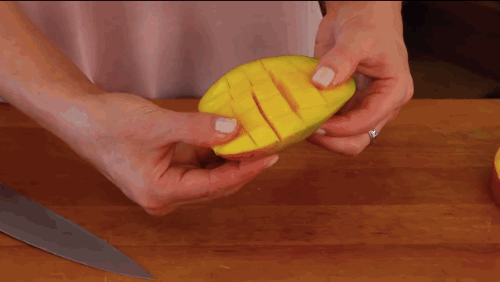 Just peel back the skin after scoring the fruit and the chunks just seem to fall away from the peel.