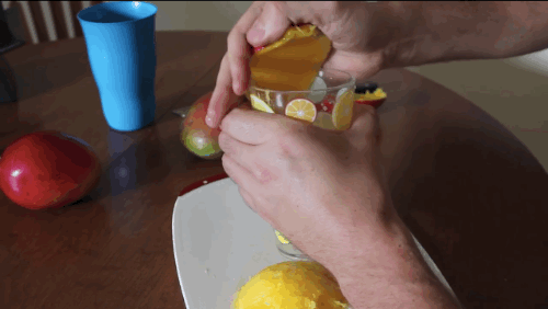 A very unique way to peel a mango.