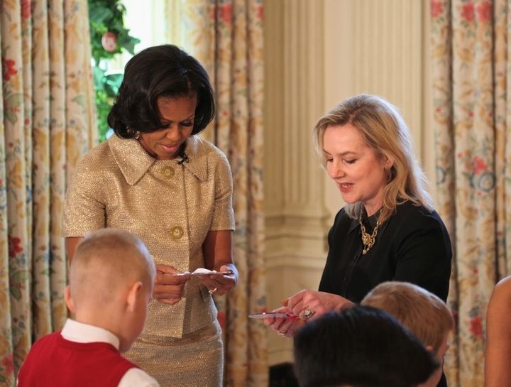 Dowling and Michelle Obama discuss floral schemes.