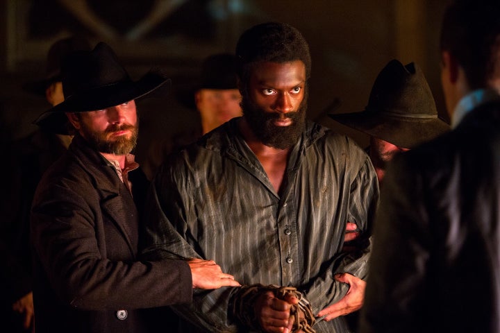 Aldis Hodge in custody of a slave catcher.