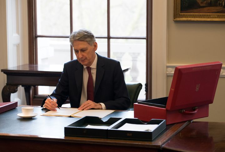Philip Hammond prepares his speech in his office at the Treasury ahead of his 2017 budget announcement