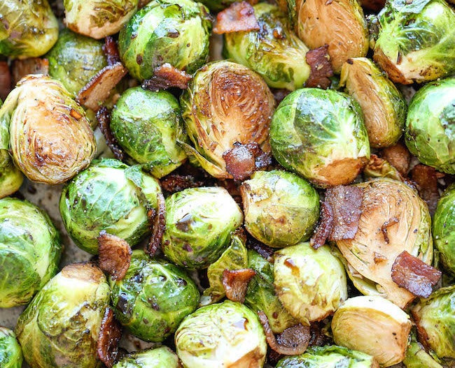 Get the Roasted Garlic And Bacon Brussels Sprouts recipe from Damn Delicious.