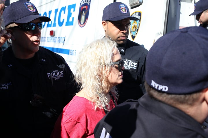 Protesters getting arrested during "A Day Without A Woman" strike outside of Trump International Hotel.