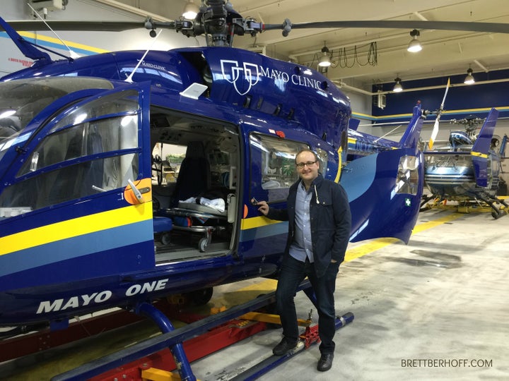 <p>Brett Berhoff checking out the Mayo Clinic Helicopter fleet</p>