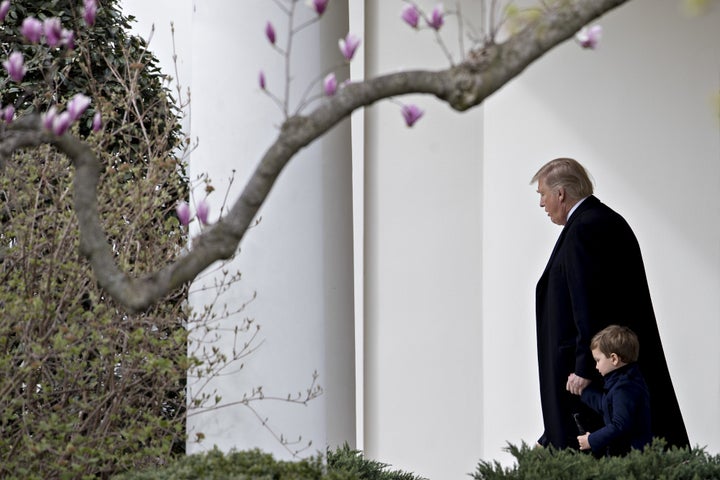 Donald Trump and his grandson depart the West Wing for Florida after a tense meeting with staff.