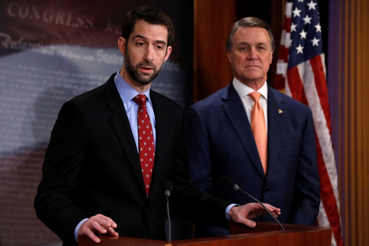 Sens. Tom Cotton (left) and David Perdue unveil their plan to slash legal immigration on Feb. 7, 2017.