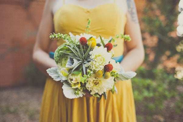 Dress your bridesmaids in pretty yellow dresses. <em>Related: <a href="http://www.bridalguide.com/dresses/complete-your-bridal-style/bridal-party-attire/bridesmaid-dresses-in-every-color" target="_blank" role="link" rel="nofollow" class=" js-entry-link cet-external-link" data-vars-item-name="Bridesmaid Dresses by Color" data-vars-item-type="text" data-vars-unit-name="58c0aaaee4b0a797c1d398f0" data-vars-unit-type="buzz_body" data-vars-target-content-id="http://www.bridalguide.com/dresses/complete-your-bridal-style/bridal-party-attire/bridesmaid-dresses-in-every-color" data-vars-target-content-type="url" data-vars-type="web_external_link" data-vars-subunit-name="article_body" data-vars-subunit-type="component" data-vars-position-in-subunit="6">Bridesmaid Dresses by Color</a></em>
